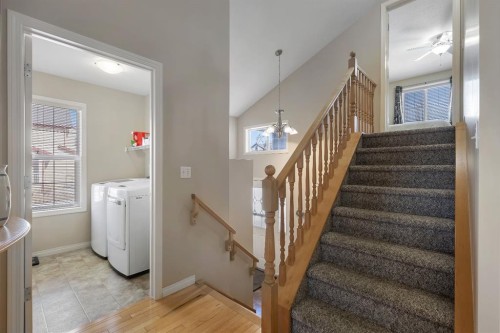 23 Evansbrooke Manor Nw, Calgary, AB - Indoor Photo Showing Laundry Room