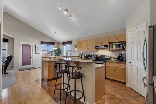 23 Evansbrooke Manor Nw, Calgary, AB - Indoor Photo Showing Kitchen With Stainless Steel Kitchen