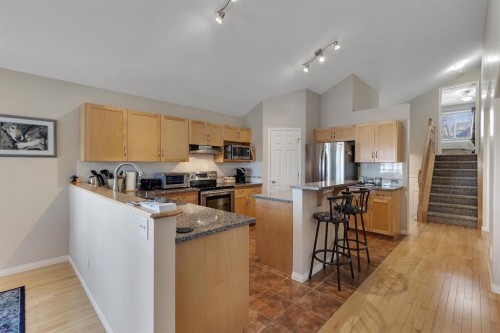 23 Evansbrooke Manor Nw, Calgary, AB - Indoor Photo Showing Kitchen With Stainless Steel Kitchen