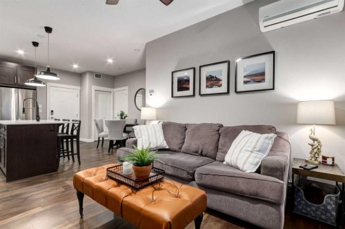312-10 Walgrove Walk Se, Calgary, AB - Indoor Photo Showing Living Room