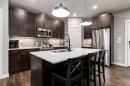 312-10 Walgrove Walk Se, Calgary, AB  - Indoor Photo Showing Kitchen With Double Sink With Upgraded Kitchen 