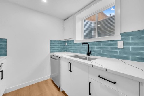 3229 Doverville Crescent Se, Calgary, AB - Indoor Photo Showing Kitchen With Double Sink