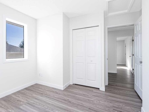 100 Catalina Circle Ne, Calgary, AB - Indoor Photo Showing Other Room