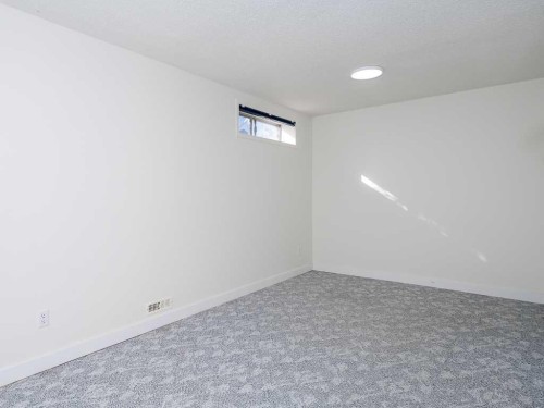 100 Catalina Circle Ne, Calgary, AB - Indoor Photo Showing Other Room