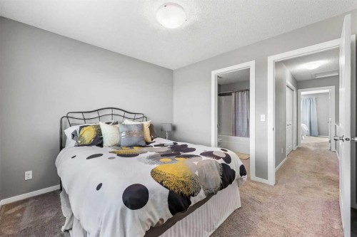 68 New Brighton Point Se, Calgary, AB - Indoor Photo Showing Bedroom