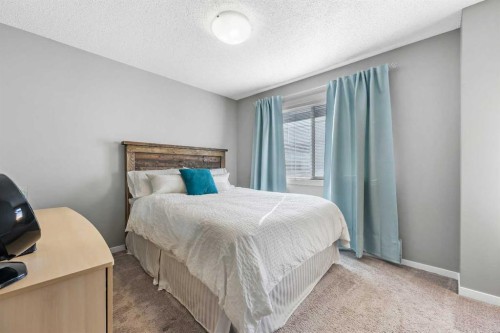 68 New Brighton Point Se, Calgary, AB - Indoor Photo Showing Bedroom