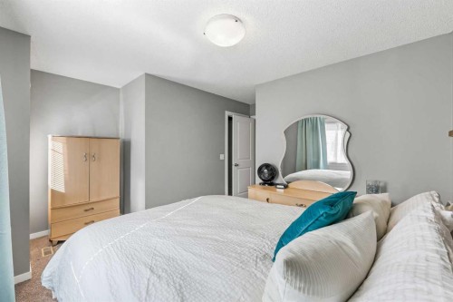 68 New Brighton Point Se, Calgary, AB - Indoor Photo Showing Bedroom