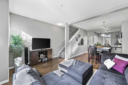 68 New Brighton Point Se, Calgary, AB - Indoor Photo Showing Living Room