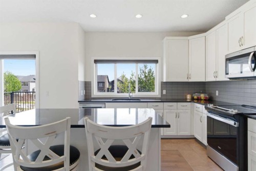 21 Evansview Manor Nw, Calgary, AB - Indoor Photo Showing Kitchen With Upgraded Kitchen