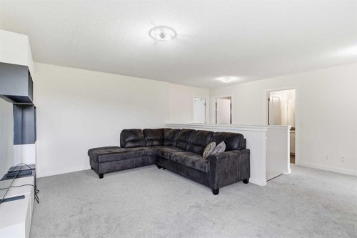 21 Evansview Manor Nw, Calgary, AB - Indoor Photo Showing Living Room