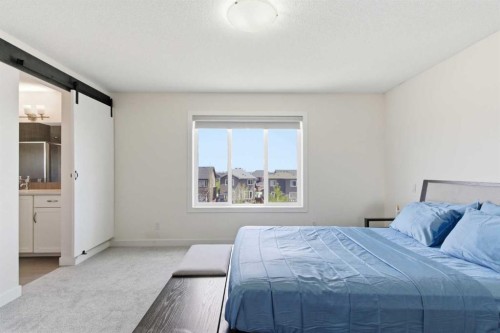 21 Evansview Manor Nw, Calgary, AB - Indoor Photo Showing Bedroom