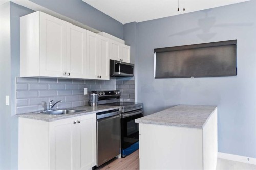 21 Evansview Manor Nw, Calgary, AB - Indoor Photo Showing Kitchen