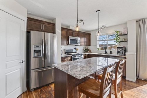338 Cranford Park Se, Calgary, AB - Indoor Photo Showing Kitchen With Upgraded Kitchen