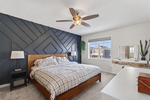 338 Cranford Park Se, Calgary, AB - Indoor Photo Showing Bedroom