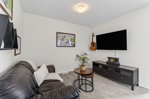 338 Cranford Park Se, Calgary, AB - Indoor Photo Showing Living Room
