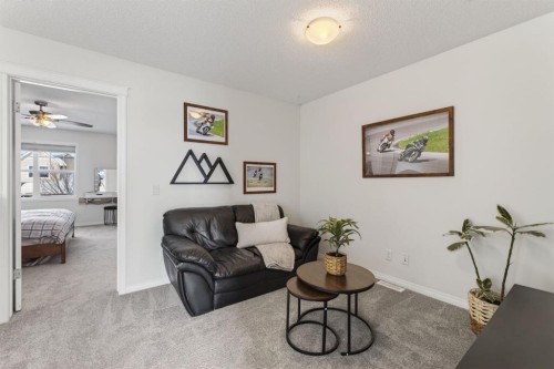 338 Cranford Park Se, Calgary, AB - Indoor Photo Showing Living Room