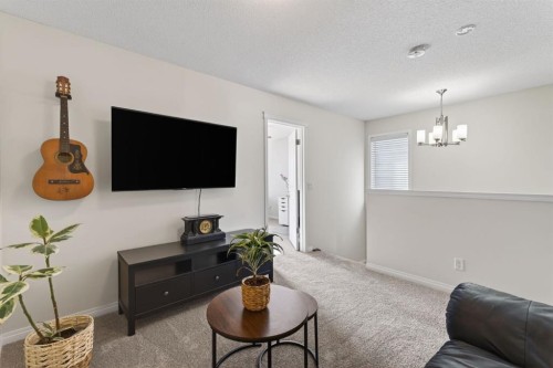 338 Cranford Park Se, Calgary, AB - Indoor Photo Showing Living Room