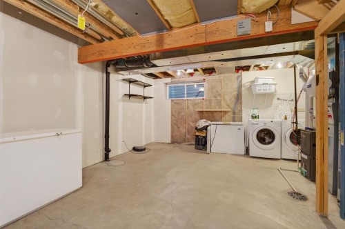 338 Cranford Park Se, Calgary, AB - Indoor Photo Showing Laundry Room