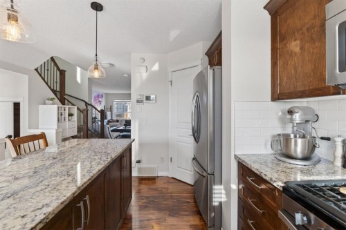 338 Cranford Park Se, Calgary, AB - Indoor Photo Showing Kitchen With Upgraded Kitchen