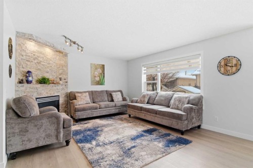39 Arbour Ridge Mews Nw, Calgary, AB - Indoor Photo Showing Living Room