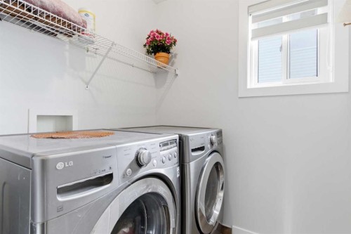 39 Arbour Ridge Mews Nw, Calgary, AB - Indoor Photo Showing Laundry Room