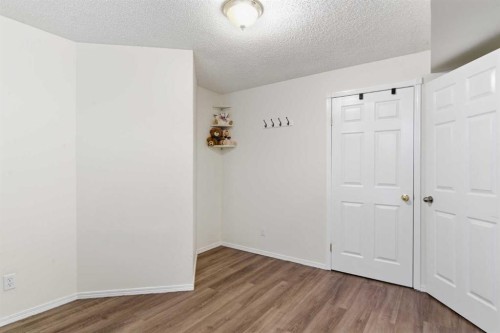 39 Arbour Ridge Mews Nw, Calgary, AB - Indoor Photo Showing Other Room