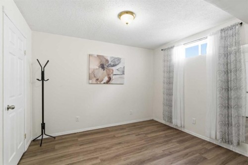 39 Arbour Ridge Mews Nw, Calgary, AB - Indoor Photo Showing Other Room