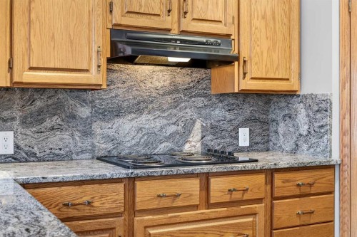1208 Sunvista Way Se, Calgary, AB - Indoor Photo Showing Kitchen