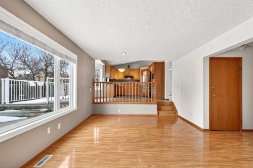 1208 Sunvista Way Se, Calgary, AB - Indoor Photo Showing Other Room