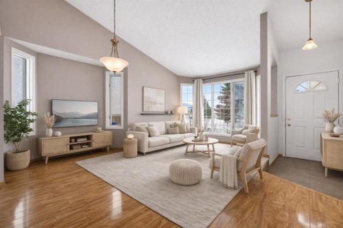 1208 Sunvista Way Se, Calgary, AB - Indoor Photo Showing Living Room