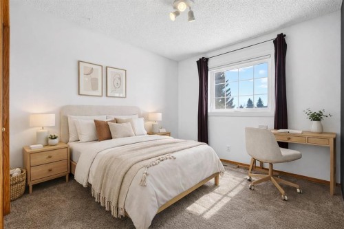 1208 Sunvista Way Se, Calgary, AB - Indoor Photo Showing Bedroom