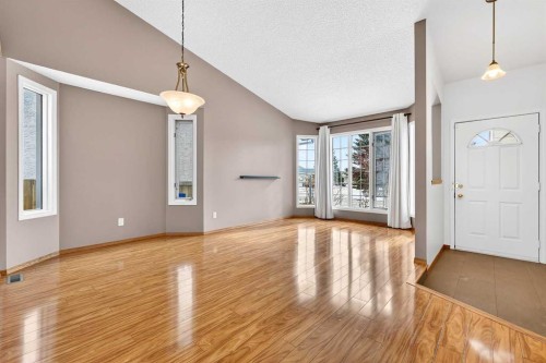 1208 Sunvista Way Se, Calgary, AB - Indoor Photo Showing Other Room