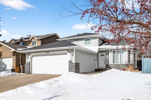 1208 Sunvista Way Se, Calgary, AB - Outdoor With Facade