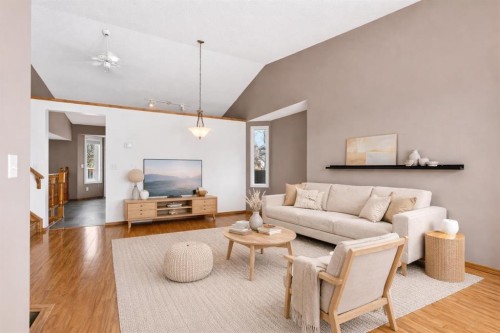 1208 Sunvista Way Se, Calgary, AB - Indoor Photo Showing Living Room
