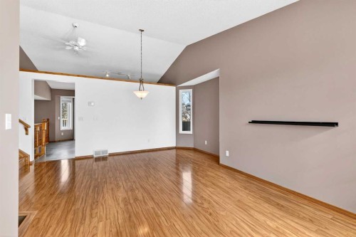 1208 Sunvista Way Se, Calgary, AB - Indoor Photo Showing Other Room