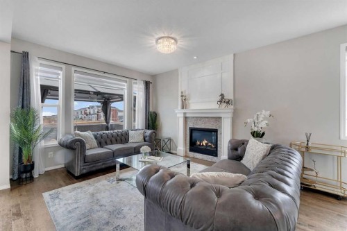 16 Nolancrest Circle Nw, Calgary, AB - Indoor Photo Showing Living Room With Fireplace