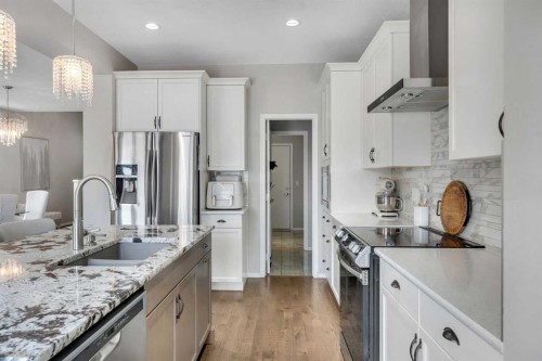16 Nolancrest Circle Nw, Calgary, AB - Indoor Photo Showing Kitchen With Upgraded Kitchen