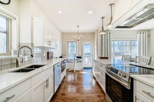 5 Bridle Estates Road Sw, Calgary, AB - Indoor Photo Showing Kitchen With Double Sink With Upgraded Kitchen