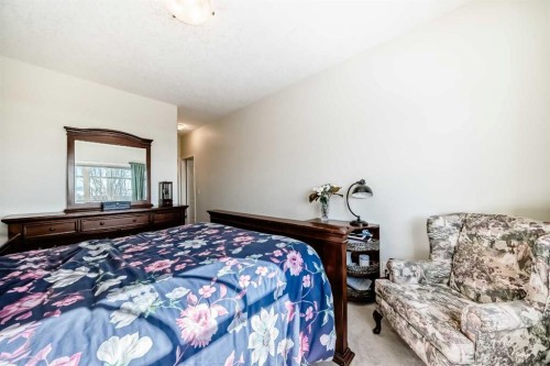 5 Bridle Estates Road Sw, Calgary, AB - Indoor Photo Showing Bedroom