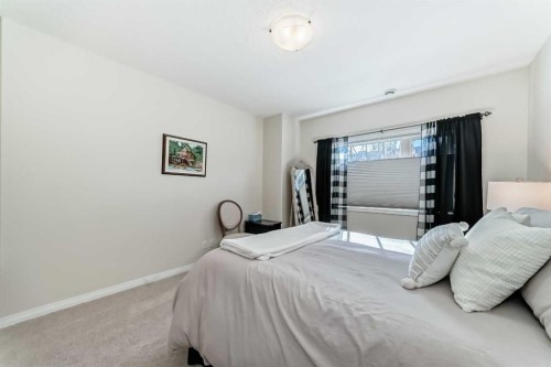 5 Bridle Estates Road Sw, Calgary, AB - Indoor Photo Showing Bedroom