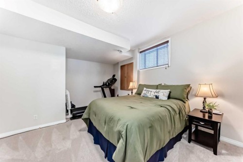 5 Bridle Estates Road Sw, Calgary, AB - Indoor Photo Showing Bedroom