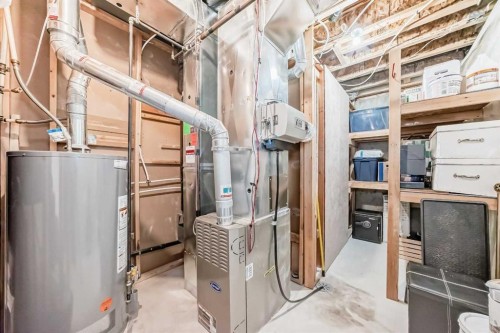 5 Bridle Estates Road Sw, Calgary, AB - Indoor Photo Showing Basement