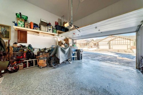 5 Bridle Estates Road Sw, Calgary, AB - Indoor Photo Showing Garage
