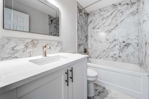 36 Pennsburg Place Se, Calgary, AB - Indoor Photo Showing Bathroom