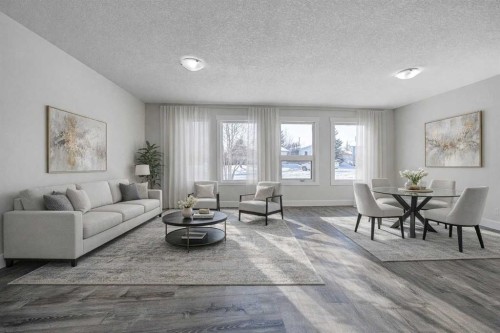 36 Pennsburg Place Se, Calgary, AB - Indoor Photo Showing Living Room