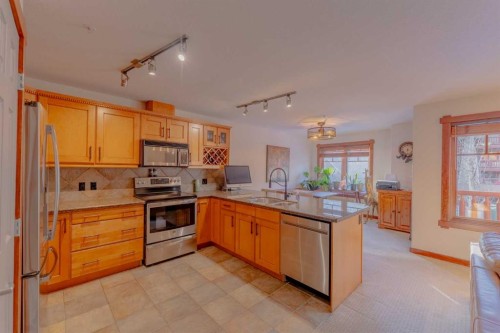 313-170 Crossbow Place, Canmore, AB - Indoor Photo Showing Kitchen
