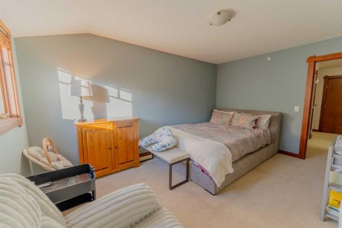 313-170 Crossbow Place, Canmore, AB - Indoor Photo Showing Bedroom