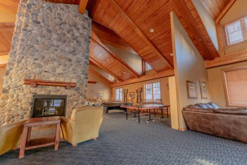 313-170 Crossbow Place, Canmore, AB - Indoor With Fireplace