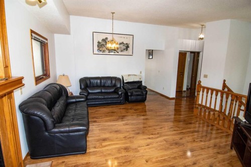 237 Sandarac Drive Nw, Calgary, AB - Indoor Photo Showing Living Room