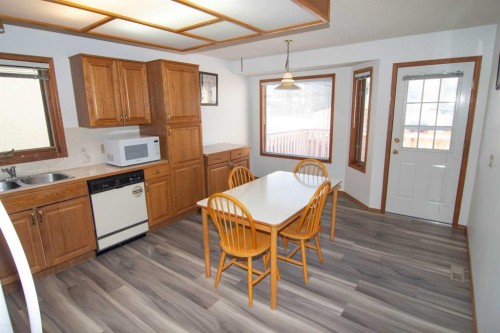 237 Sandarac Drive Nw, Calgary, AB - Indoor Photo Showing Kitchen With Double Sink
